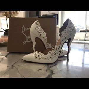 Christian Louboutin White laser cut pumps sz 38.5